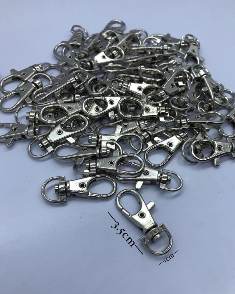 GÜMÜŞ PAPAĞAN ÇANTA KLİPSİ